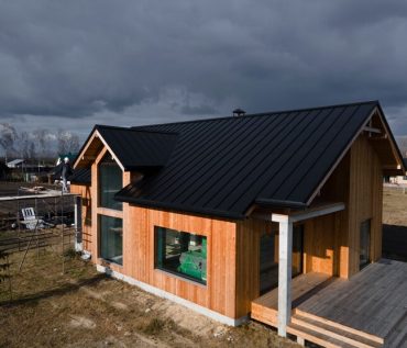 beautiful-wooden-house-with-big-windows_23-2149343704