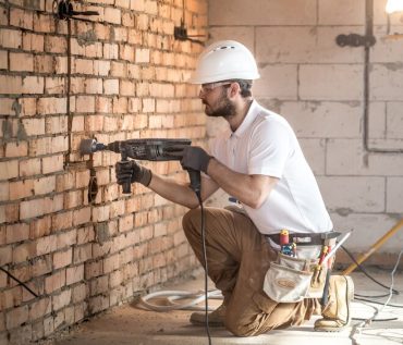 Handyman Uses Jackhammer